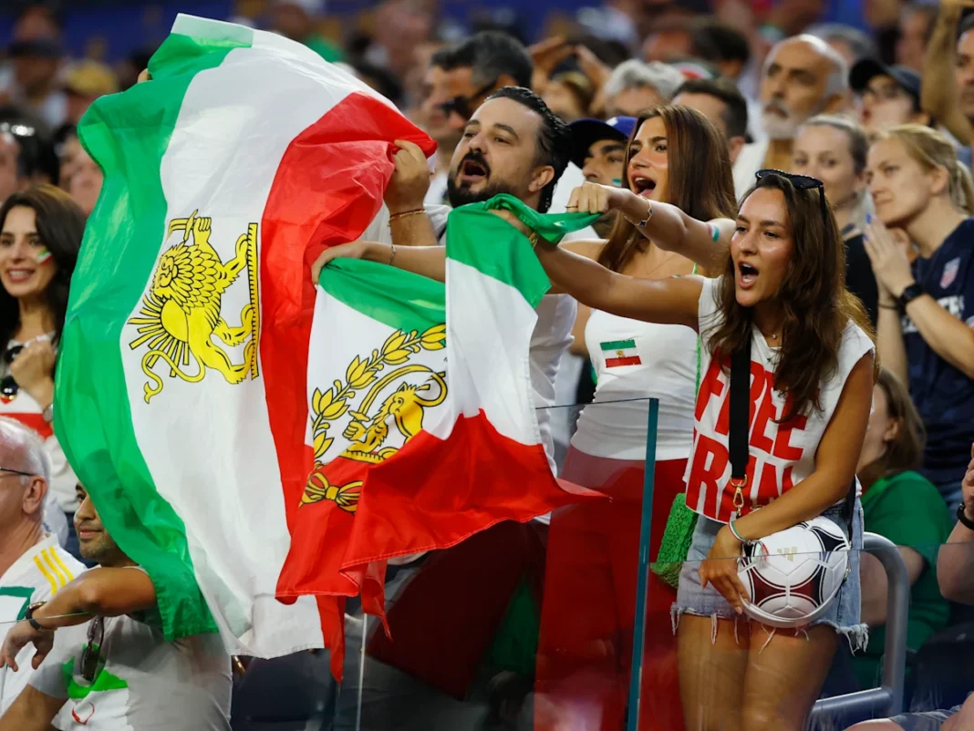 FIFA banned the pre-revolutionary Iranian flag at the World Cup. Fans smuggled it in anyway. Some sewed it together inside the stadium FIFA banned the pre-revolutionary Iranian flag at the World Cup. Fans smuggled it in anyway. Some sewed it together inside the stadium