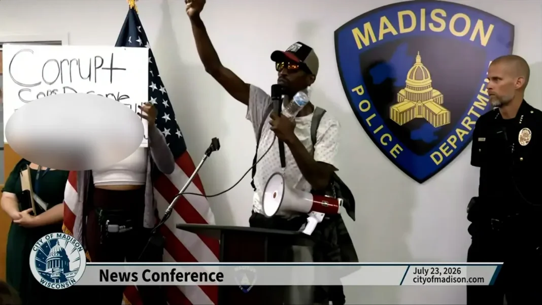 A protester grabbed a Madison police chief’s mic and denounced cops, capitalism, imperialism, and Zionism A protester grabbed a Madison police chief’s mic and denounced cops, capitalism, imperialism, and Zionism
