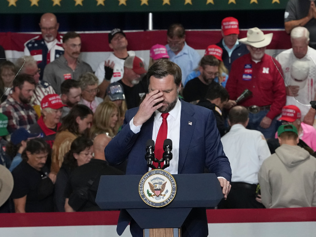 Woman Collapses Behind JD Vance Mid-Rally Woman Collapses Behind JD Vance Mid-Rally